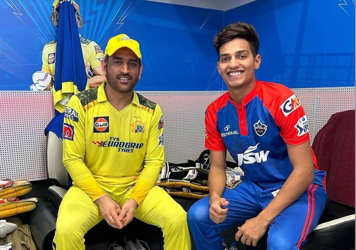 Yash Dhull with MS Dhoni [x]
